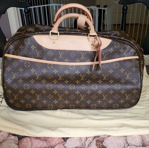 Louis Vuitton rolling weekender bag, like new.